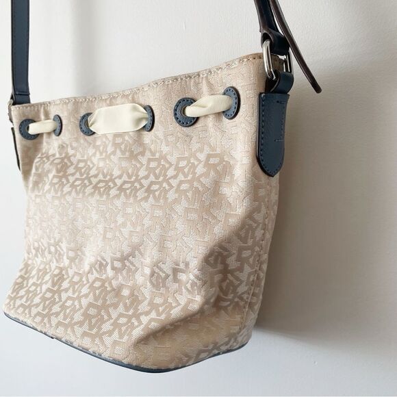 DKNY Ivory Cream and Blue Trims Lace Bow Front Bucket Style Crossbody Purse Bag - Picture 5 of 14